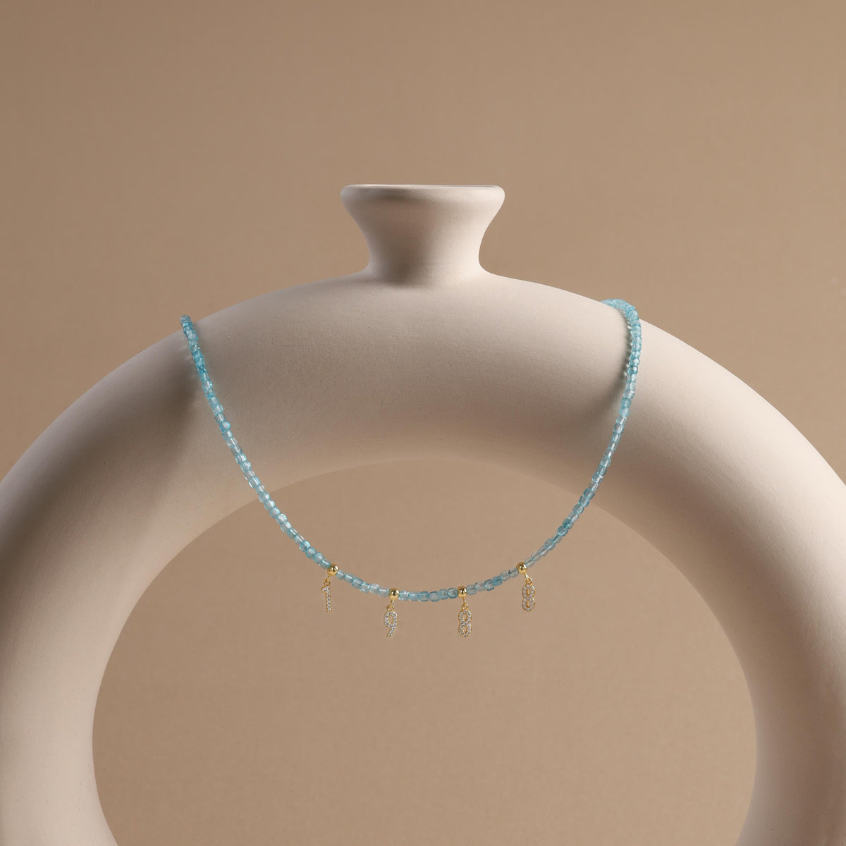 Ocean Blue Topaz Initial Necklace