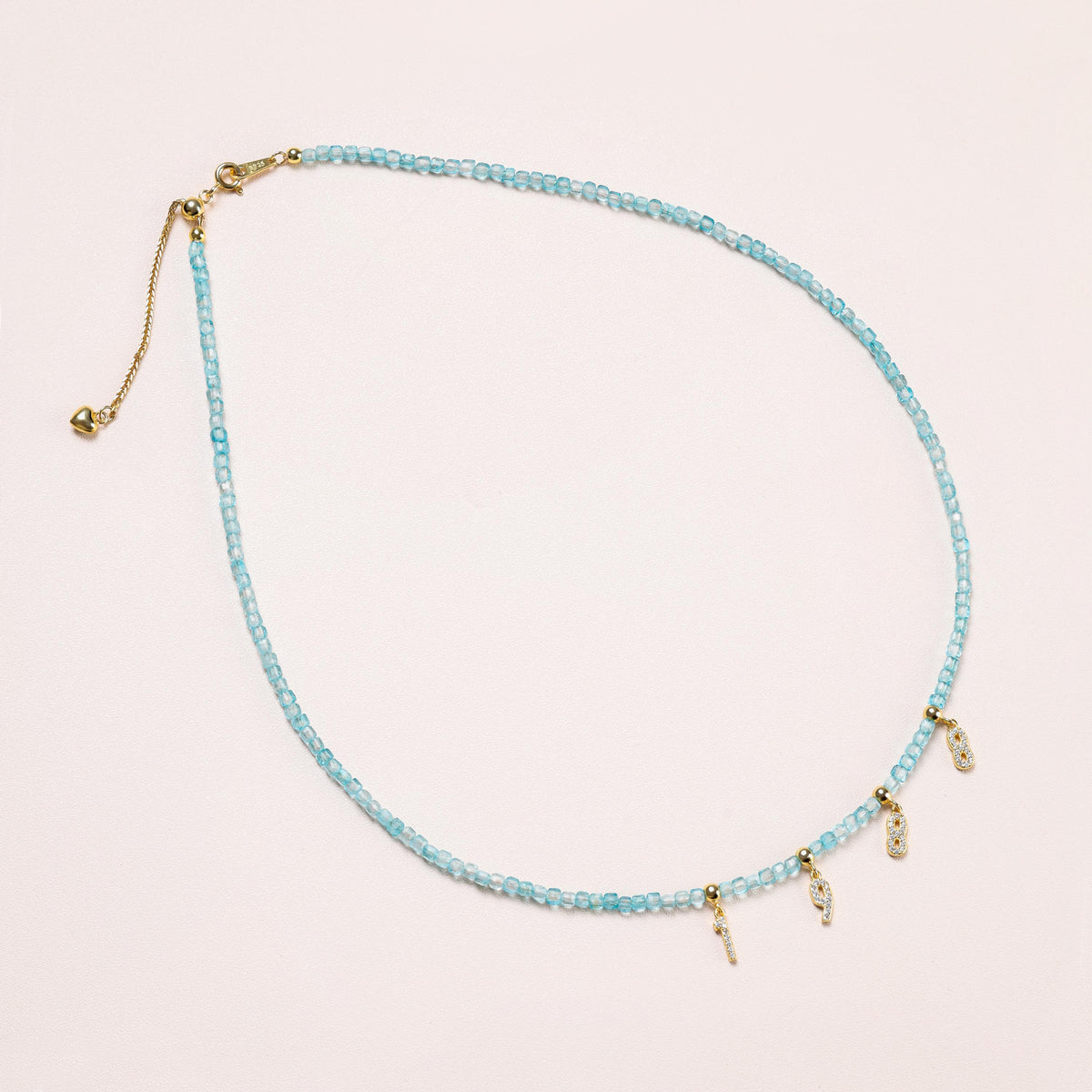 Ocean Blue Topaz Initial Necklace